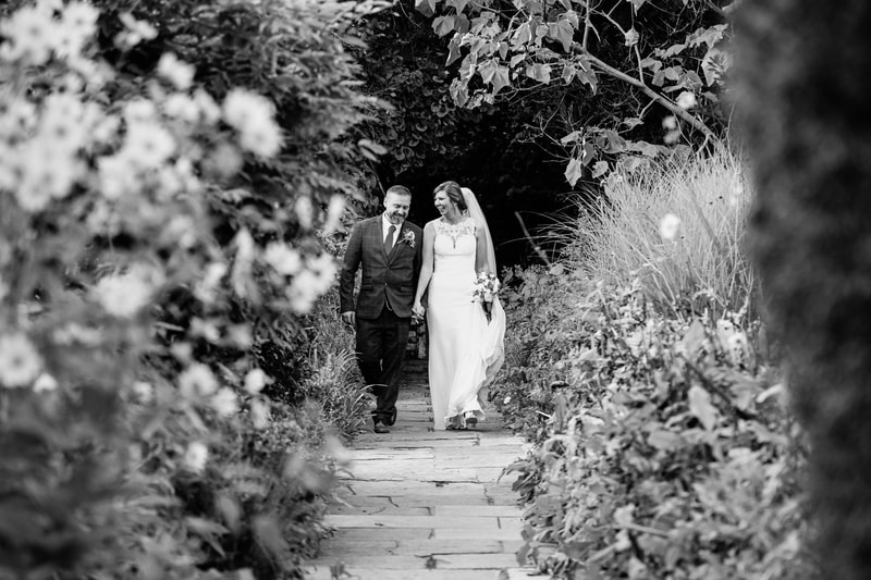 Natural wedding photography, bride and groom portrait in the gardens at cotswold house hotel and spa