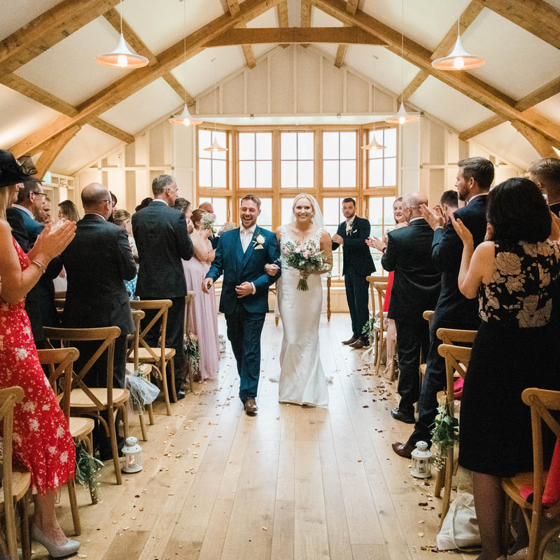 Barn wedding ceremony in the cotswolds. 